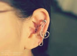 Tiny Music Note Tattoos On The Left Ear Note Tattoo Tattoos Music Notes Tattoo