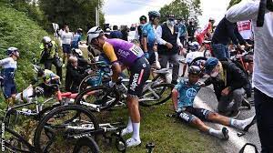 A fan holding a cardboard sign at the tour de france impeded the progress of cyclists and caused a major crash during stage 1 of the race saturday. O1qphduo3h6yzm