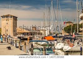 Cervia Ra Italy May 17 2019 Boats Mooring In Port Channel Of Cervia With Medieval Tower In Background Please Repin Stock Photos Medieval Tower Italy