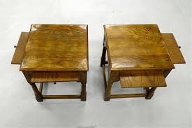 Complete your yard setup with outdoor accent tables. Two Small End Tables With Slide Out Shelves