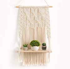 This one has a symmetrical feel to it that keeps it modern. Buy Omomio Macrame Wall Hanging Shelf Indoor Boho Wall Decor For Bedroom Woven Rope Bohemian Shelves Macrame Shelf Wall Hanging For Plant Hanger Or Holder With Crochet Decor 17