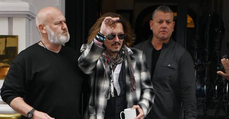 Johnny Depp settles lawsuit with 'City of lies' crew member who accused him of assault