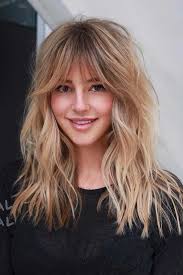 The long curls flatter the round face by providing angles and movement that the face naturally doesn't have. How To Choose The Right Layered Haircuts Lovehairstyles Com
