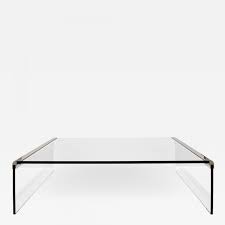 The minimalist style design can be perfectly integrated into your modern furniture atmosphere without any abrupt feeling. Pace Collection Pace Glass Waterfall Coffee Table 1970s