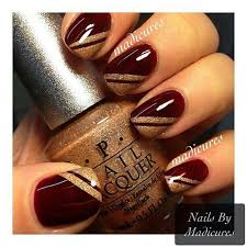 My nail tech used lauque'd gel. Maroon And Gold Nails Pepe