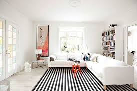 7 More Ways To Make A Small Room Look Bigger Tiny Apartment Decorating Rugs In Living Room Living Room Designs