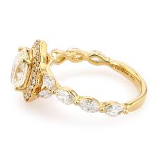 The Florence diamond halo engagement ring is a timeless symbol of enduring  love. Featuring 2.10 total carat weight, it showcases a 1.20ct oval-shaped  natural diamond center stone, complemented by 0.80tw marquise-shaped  diamonds