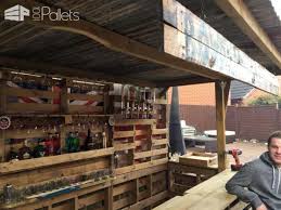 Making The Ultimate Garden Bar Using Pallets Diy Pallet Bars Pallet Terraces Pallet Patios Garden Bar Pallet Pallet Bar
