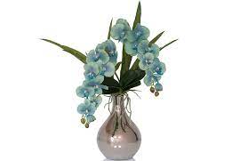 This faux floral will afford you all the joy and beauty of the outdoors, without any of the work. Ocean Blue Faux Orchids Preserved Floral Arrangements Silk Flowers