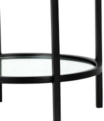 Polished silver metal drawer handles add a sleek touch. Buy Hyde Round Black Metal Side Table The Furn Shop