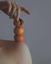 Photographer Creates Surreal Minimalist Self Portraits Surrounded By Flowers And Fruits Photography Inspiration Portrait Surrealism Self Portrait Photography