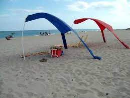 Your shade sail should be firm and tight to reduce wind flap. Beach Sails In Action Youtube