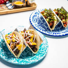 Choose from chicken, beef, or fish tacos served with mango tartar sauce and fresh pico de gallo. Lola Taqueria Restaurant Palm Beach Aruba Opentable