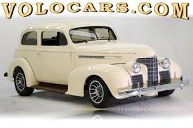 Image result for Trojan Maroon 1939 Oldsmobile