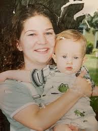 Here's a pic of our daughter and husband. Can you clean it up?