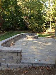 Next start gluing down your paver border to your retaining wall blocks with landscape adhesive. Charlotte Paver Patio With Retaining Wall And Fire Pit American Traditional Patio Charlotte By Archadeck Of Charlotte Houzz