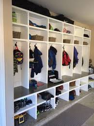 When i realized how much wasted space i had in my garage and how disorganized it was getting, i started thinking about cool new ways to turn my garage into a useful, livable space. Garage Cubbies 6 Lockers One For Every Family Member 12 5 Feet Long 8 Feet Tall Base Is 24 Deep Top Secti Mudroom Cubbies Mud Room Garage Diy Cubbies