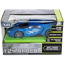 Hand presses on remote control car. Racer Remote Control Car 1 24 Scale Let Go Have Fun