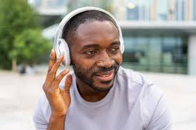 Music Song Concept. Good Start Day. Happy African American Man Listening  Modern Hit