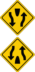 Route numbers on a blue background show the direction to a motorway. National Driving School