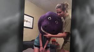 Peter griffin, joe swanson also appearing: Teenage Girl Gets Head Stuck In Barney Mask Cbs News