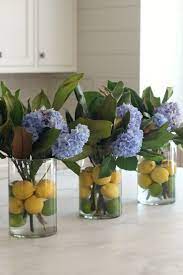 Choose flowers that match your meal: Summer Progressive Dinner Party Citrus And Hydrangea Centerpiece Hydrangea Flower Arrangements Summer Flower Arrangements Flower Arrangements