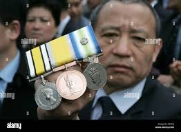 Holds medal hi-res stock photography and images