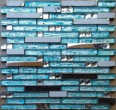 For an out of the box look, you could play with some irregular patterns and motifs and choose colors like blue and turquoise to give your bathroom a truly refreshing mosaic look. Aqua Glass Silver Metal Tiles Backsplash Diamond Stainless Steel Mosaic Tile Bathroom Designs Hominter Building Materials Co Ltd Ecplaza Net