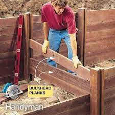 How To Build A Treated Wood Retaining Wall Wood Retaining Wall Building A Retaining Wall Retaining Wall