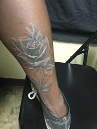 White Tattoos On Dark Skin White Tattoo Dark Skin Skin Color Tattoos White Tattoo