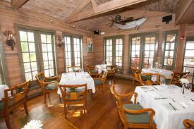 Garlic, shallots, white wine, french fries, crusty bread. Little Palm Island Resort Spa A Noble House Resort Dining Room At Little Palm At The Little Palm Island Resort Spa A Noble House Resort Oyster Com Hotel Photos
