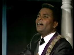 Waylon Jennings sings a song written by Harlan Howard, "What Makes a Man  Wander"