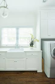 Check out how my farmhouse laundry room is doing one year later!! Farmhouse Laundry Rooms Country Laundry Room John Hummel