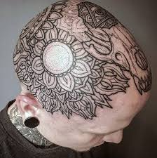 It symbolizes an individual who is highly accomplished in a field of their life; Top 101 Head Tattoo Ideas 2021 Inspiration Guide