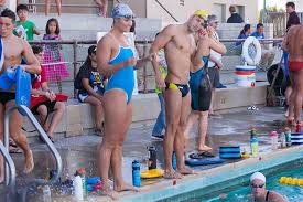 It won't keep you hair completely dry, but it will help to keep the swimming pool water from continually washing over your hair. Why You Should Wear A Swim Cap At The Pool