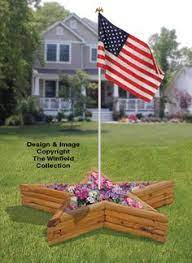 This display is simple, yet distinguished and patriotic. 33 Best Flag Pole Landscaping Ideas Flag Pole Landscaping Flag Pole Flagpole Landscaping Ideas