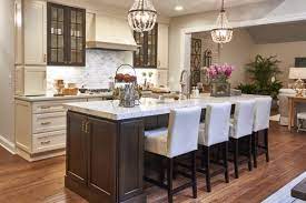 Brown kitchen cabinets with white island. Off White Cabinets With Woodland Brown Island Crystal Cabinets