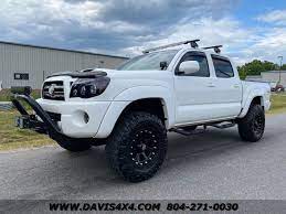 Lifted with custom wheel and tire package. 2010 Toyota Tacoma Double Cab 4x4 Trd Sport Lifted Pickup