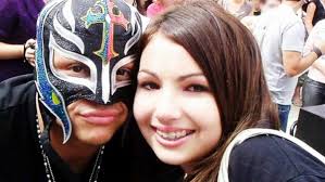 A young Billie Kay takes a picture with Rey Mysterio . : r/SquaredCircle