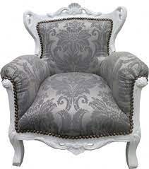 With a structure in steel and feet in solid ash with matte stained finish, this captivating armchair has the backrest upholstered in charcoal grey and the seat in white with molded polyurethane foam padding. Casa Padrino Baroque Kids Armchair Gray Baroque Pattern White Baroque Furniture Limited Edition