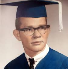 Mothers of graduates I need your help. Our school colors are red and black.  I bought a red dress to wear to graduation but feel it's way too matchy  with his gown.