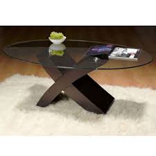 It's obviously a bit longer than a round coffee table, so it gives you as much surface area as possible while still offering a softer, more organic shape. Uber Cool Brown X Design Oval Shape Glass Top Coffee Table Buy Coffee Tables Online Discount Coffee Tables Uk