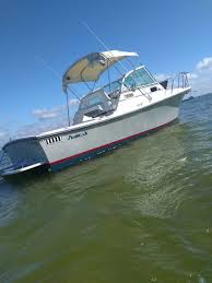 Ski boat or cruiser with cuddy cabin. Shamrock Boats Keel Drive