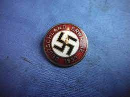 There is a swastika in the center. Military Antiques And Museum Gii 0004 Third Reich German Deutschland Erwache 1933 Nazi Party Election Pin 149 95