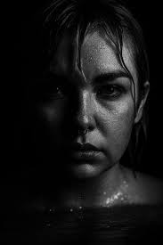 High contrast black and white portrait with lashes