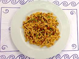 One of bologna's many famed egg pastas, gramigna (little weeds where: Gramigna Con La Salsiccia Martino Ragusa Il Blog