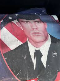 Who is in charge of highway service signs?