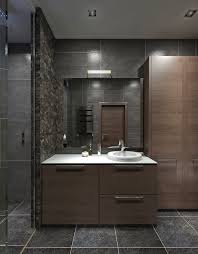 Blue mini brick backlash tiles above a gray bath vanity with gray shaker cabinets and polished nickel pulls topped with black granite countertops. 12 Sensational Bathroom Cabinet Design Ideas Angi Angie S List