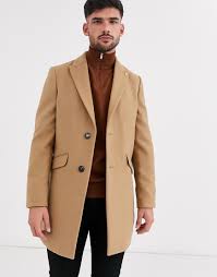 Funnel neck must haves latest trends religion asos high neck dress shopping black dresses. Religion Faux Shearling Asymmetric Overcoat In Tan Compare Grazia