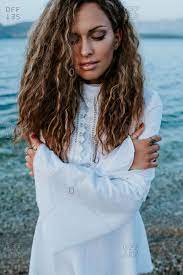 Get it as soon as wed, jun 30. Portrait Of Girl With Long Curly Hair In White Summer Dress On The Beach At The Sea Stock Images Page Everypixel
